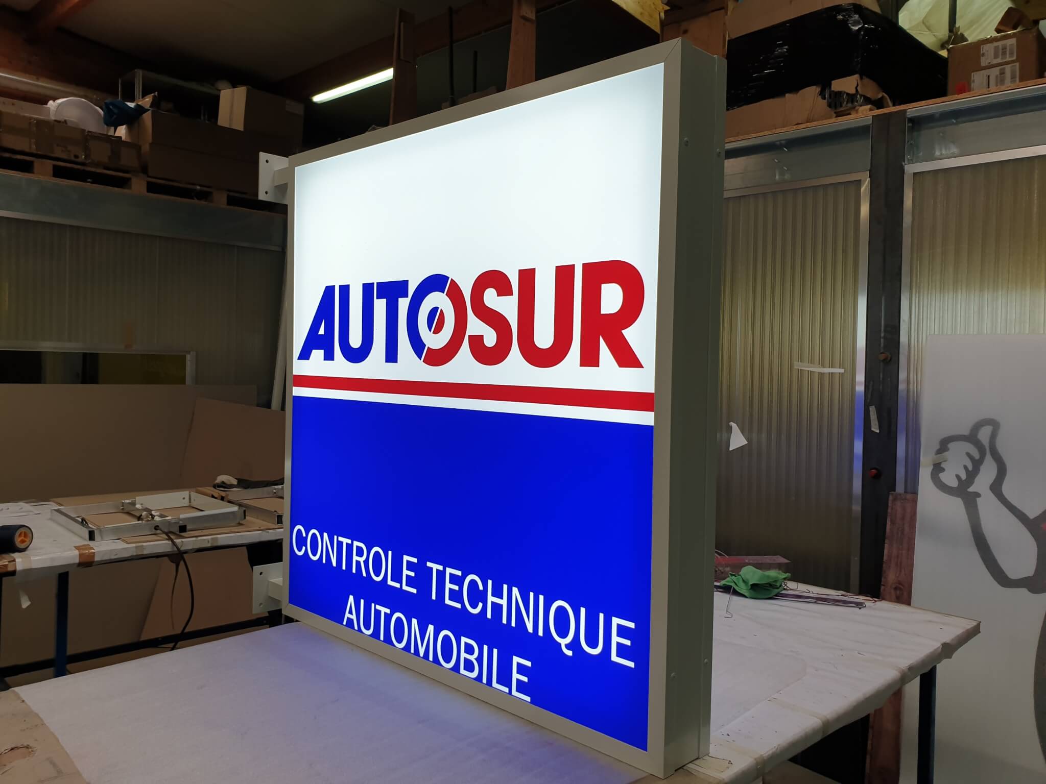 Enseigne drapeau – Autosur